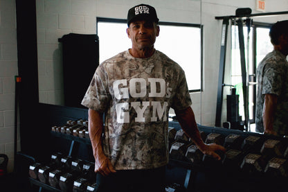 God's Gym Faded Camo Tee at the dumbbell rack